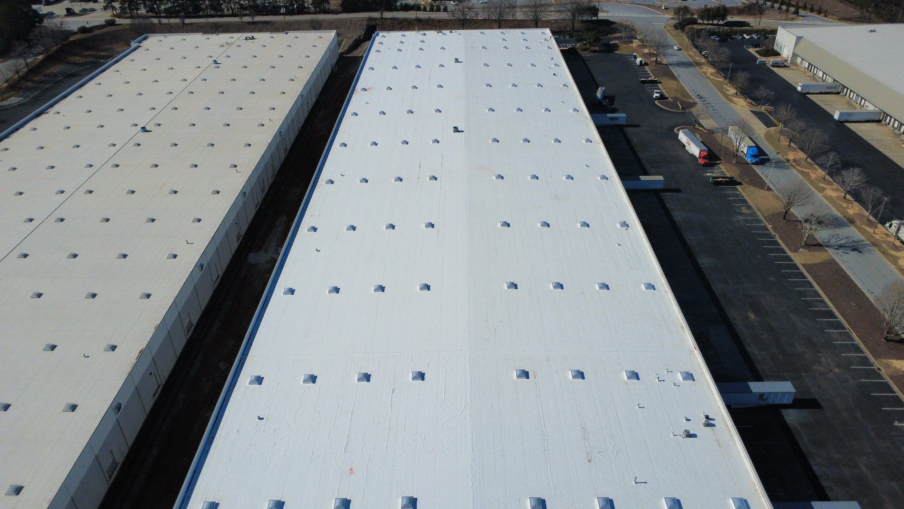 After photo - Another aerial perspective of the finished mechanically attached TPO overlay and modernized skylight layout